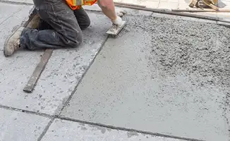 Professional repairing a concrete floor in Atlanta, GA