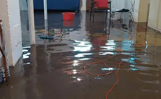 Basement with boiler, cabinets and washing machine completely flooded in Atlanta, GA