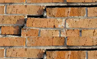 Brick wall with serious structural damage in Atlanta, GA